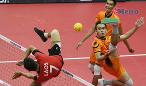 With a literal translation of 'kick ball', 3 players compete against their opposition on a volleyball style court with a net across the middle. Andaian Tak Benar