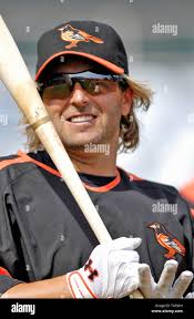 Baltimore Orioles first baseman Kevin Millar (15) kicks his bat after  striking out in the sixth inning against Cleveland Indians pitcher Fausto  Carmona