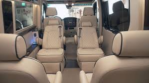 Cargo/club storage area that holds up to 12 golf bags and luggage. This Posh Mercedes Sprinter Has Its Own Bathroom And Kitchen