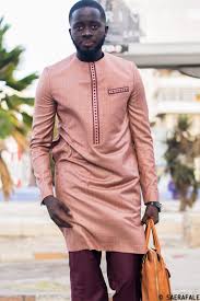 Tribal mark outfits | vetement africain homme, tenue. Pin By Merry Loum On Men S Fashion African Men Fashion African Dresses Men African Clothing For Men