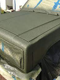 You will get better texture rolling it, but it may not be as even as a. Paint After Bed Liner Two Quarts Of Hunter Green Gloss One Quart Of Rust Red Primer Mixed Then Thinned Down To S Bed Liner Paint Bedliner Paint Job Bed Liner