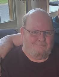 Obituary information for John L. Woodman Jr.