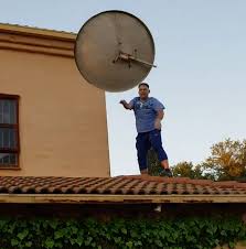 TV with Thinus: Angry singer Steve Hofmeyr films how he cancels his  MultiChoice account, rips DStv dish off the roof and workers showing him to  keep driving over his DStv decoder as