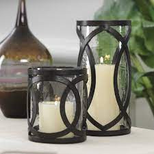Find the perfect decorative accents at hayneedle, where you can buy online while you explore our room designs and curated looks for tips. Wrought Iron Hurricane Candle Holders Ideas On Foter