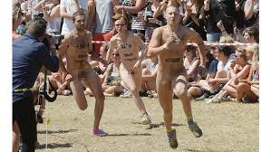Festival goers strip off for nude fun run