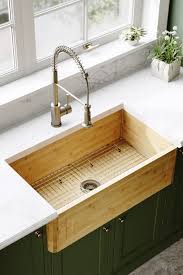 Install the strainer or garbage disposal to the sink according to the manufacturer's instructions. 895 Single Bowl Bamboo Apron Sink Kitchen Design Small Kitchen Renovation Apron Sink