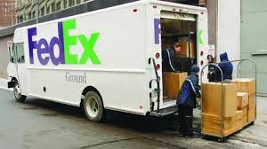Fedex Ground Vehicle And Employees Making Deliveries Fedex Express Parcel Delivery Parcel