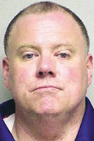 Cop stalker sentenced to year in jail