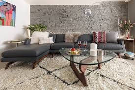 Carving out the main living area is a planter room divider, which enlivens the space with gorgeous greenery. Home Decorating With Modern Contemporary Moroccan Style Area Rugs House Interior Design Styles Home Interior Design Interior Design Styles