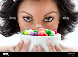 Purple and green candy hi-res stock photography and images