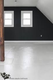 Any wood defects have been repaired with synthetic filler, so the veneer can be painted. How To Paint Plywood Floors The Wood Grain Cottage