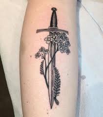 Sword And Flowers Tattoo Inked In A Dot Work Style On The Left Calf Tattoos Flame Tattoos Sword Tattoo