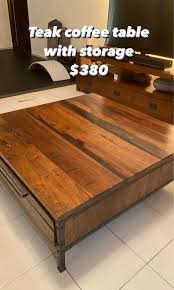 A coffee table is always a useful feature in the living room and sometimes they install them with shelves underneath, but what if you need something a little more storage related for items you don't want to roll around. Teak Coffee Table With Storage Furniture Home Living Furniture Tables Sets On Carousell