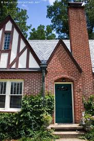 Tudor cottage tudor house cozy cottage beautiful gardens beautiful homes beautiful places door overhang english country style english. My Best Friend Craig Tudor Houses With Painted Front Doors Tudor House Exterior Brick House Front Door Colors Red Brick House