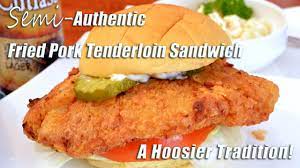 It is then placed on a bun and served, most often, with lettuce, tomato, onion and mustard. Fried Pork Tenderloin Sandwich Hoosier Favorite Youtube