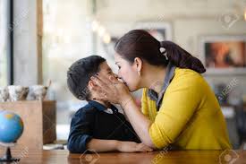 Asian Mother Kissing Her Son, Lifestyle Concept. Stock Photo, Picture and  Royalty Free Image. Image 97834567.