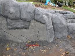 Koi pond and waterfalls design, creation, installation and maintenance. Fake Rock Waterfall