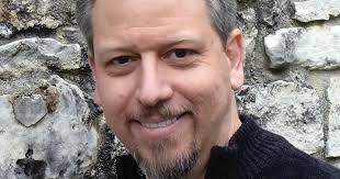 Where did it begin for Castle Panic creator Justin De Witt?