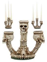 The zombie skeletons are willing to stand there and hold your candles for you indefinitely! Ebros Gothic Trio Ossuary Graveyard Skulls And Skeleton Bones Candelabra Candle Holder Statue Wicked Skeletal Altar Shrine Figurine Buy Online At Best Price In Uae Amazon Ae