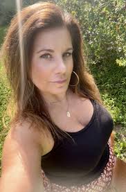 By the Sea** **Going by bus to a small Buddhist forest monastery by the  sea,** **I walked down the path through the woods to the blue of the sea,**  **Among the dark