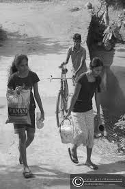 Villagers Walking To The Farms To Distribute The Mid Day Meal Rice And Curry Its Important To Notice That The Younger Brother In Two By Two Laughter Younger