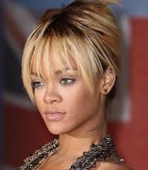Rihanna with street style side shaved long hair. Rihanna With Blonde Updo With Long Bangs