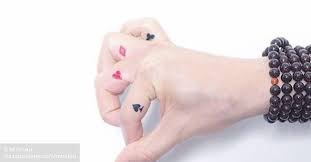 Clubs, hearts, spades, diamonds (supposedly mnemonic as they have respectively 3, 2, 1, 0 lobes; Club Diamond Heart And Spade Symbol Tattoos On The