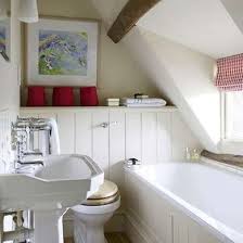 By choosing the suitable furnishing you can get a soft and serene feel in your attic bathroom as the place is usually flooded with natural light. Under The Eaves 21 Arresting Attic Rooms Small Attic Bathroom Small Bathroom Small Bathroom Remodel
