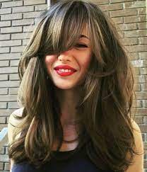 Wispy bangs with layered haircuts. Top 7 Layered Haircuts For Long Hair Women