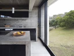 Luciano Kruk S Casa Carilo Appears To Float Above The Argentinian Landscape Ignant Vacation Home Private Garden Design Concrete Interiors