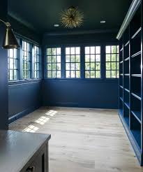 Gentleman S Blue By Benjamin Moore Walls Ceilings Trims And Bookcases All Painted In The Same Color Full Wall Of Wind Ceiling Trim Wall Trim Window Trim