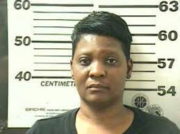 Mobile woman charged with taking money while working as a caregiver