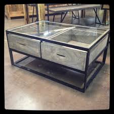 This glass display coffee table is custom built in the shape of a small boat. Glass Top Coffee Table With Drawers Nadeau Dallas