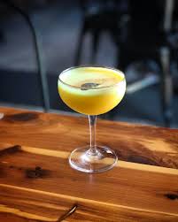 Striking Opaque Yellow And The Distinct Flavor Of Curry Define The Golden State Cocktail Rieger S Gin Dry Curacao Turmeric G Cocktails Pretty Drinks Curry
