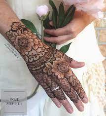 Image May Contain One Or More People Mehndi Designs For Fingers Mehndi Design Photos Henna Tattoo Designs