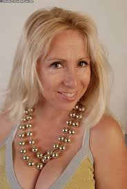 Blonde MILF Heather strips down and unveils her big boobs - Pichunter