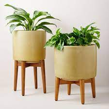 Did you scroll all this way to get facts about west elm planter ? Mid Century Turned Wood Leg Planters Yellow Crackle
