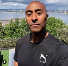 I'm proudly wearing the limited edition T-shirt the lads designed for Puma  celebrating 25 years of my 60 hurdles indoor world record