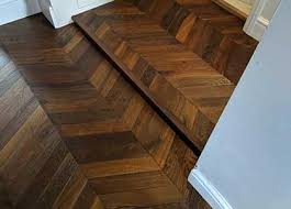 Use a circular saw to cut the old hardwood into pieces, then remove the old flooring. Floor Transition Ideas Expert Advice Craftedforlife