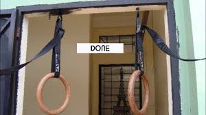 installing gymnastic rings on the