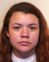 Woman suing Apache County has felony record