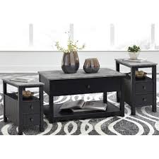 Coffee table sets are an easy way to create a matching look. Rent To Own Ashley 3 Piece Ezonie Cocktail 2 End Tables Set At Aaron S Today