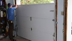How to replace a garage door opener. Garage Door Panel Replacement Girard S Garage Door Service