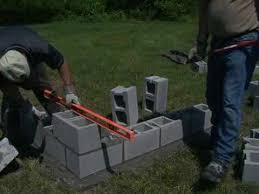 Butter the ears of the second block in this course and continue laying the block three or four courses high. Build A Concrete Block Wall Instructables