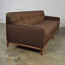 These tufts can also be included in the seating or bench. Mid Century Modern Tufted Tight Back Tuxedo Sofa On Walnut Base For Sale At 1stdibs