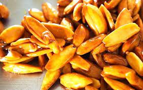 This Santan Coco Jam With Pili Nuts Recipe Is Not Referring To The Santan Flower But Is A Bicolano Language Pili Nut Nut Recipes Coconut Jam