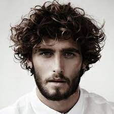 15 Best Shaggy Hairstyles For Men 2021 Haircut Guide Curly Hair Men Men S Curly Hairstyles Beard Hairstyle