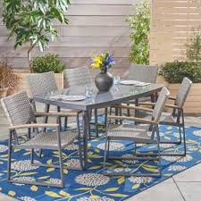 Noble House Manchester Gray 7 Piece Aluminum And Wicker Outdoor Dining Set With Glass Table Top 42981 The Home Depot Wicker Dining Set Outdoor Dining Set 7 Piece Dining Set