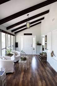Hard Wood Floors And White Walls With Dark Wood On Ceiling Joanna Gaines House Home House Interior