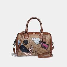 Coach keith haring khaki signature canvas with patches large pouch f66585top rated seller. Coach F48729 Keith Haring Mini Bennett Satchel In Signature Canvas With Patches Khaki Multi Imitation Gold Coach New Arrivals